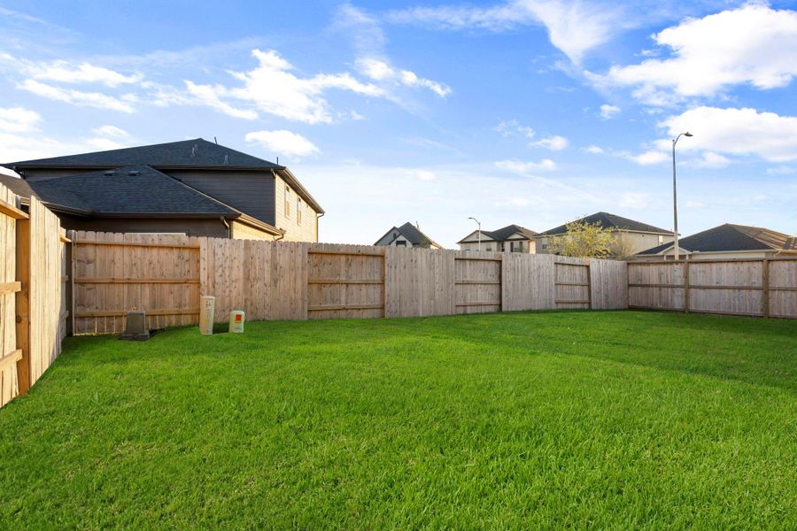 The spacious backyard offers endless possibilities for play, gardening, or adding a future pool. Fully fenced for privacy, it provides a safe and open space for family gatherings or quiet afternoons outdoors. The spacious backyard offers endless possibilities for play, gardening, or adding a future pool. Fully fenced for privacy, it provides a safe and open space for family gatherings or quiet afternoons outdoors.