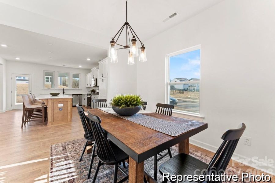 Furnished interior view inside a new home in Whispering Hills, Locust (Image 5).