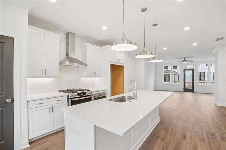 Kitchen includes SS applainces, stove , Oven and Microwave. Pictures of not of actual home but same floorplan with similar options in same community* Townhome is complete