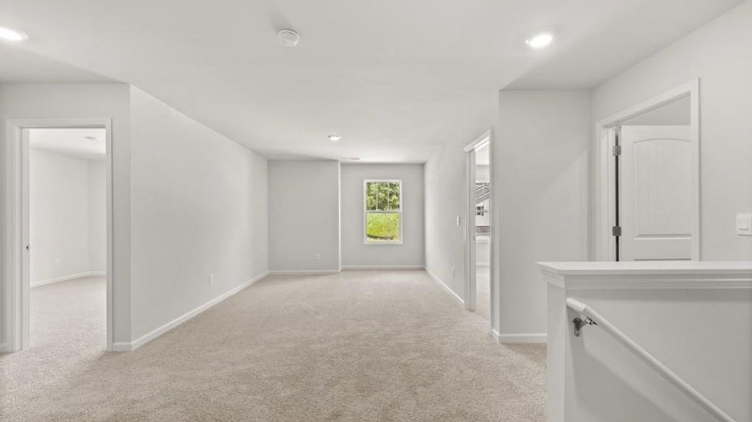 Spacious, unfurnished interior of a new home in Northwoods at Mirror Lake, Villa Rica (Image 38).