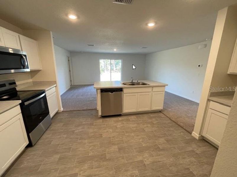 Furnished interior view inside a new home in Palm Coast: Value Collection, Palm Coast (Image 7). Furnished interior view inside a new home in Palm Coast: Value Collection, Palm Coast (Image 7).