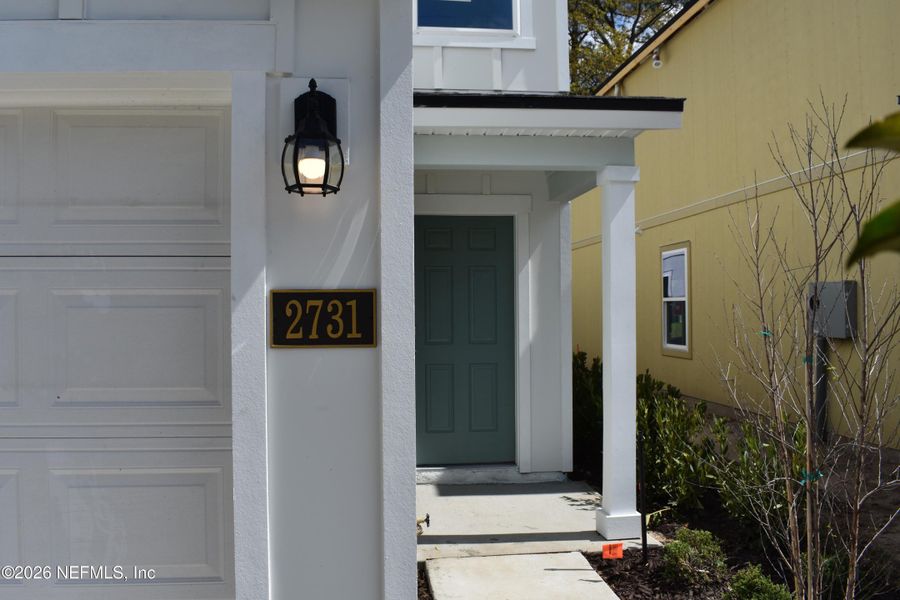 Exterior details and patio area of a home in Irongate Villas, Jacksonville (Image 3).