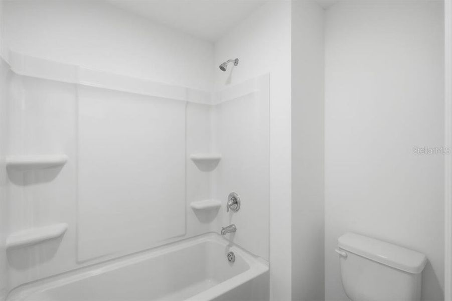 Furnished interior view inside a new home in Waterstone, Groveland (Image 11).