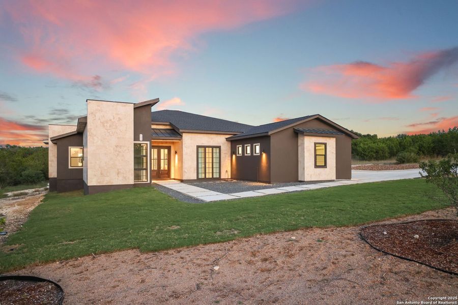 Front exterior of a new home in , Spring Branch, TX, highlighting curb appeal (Image 27).