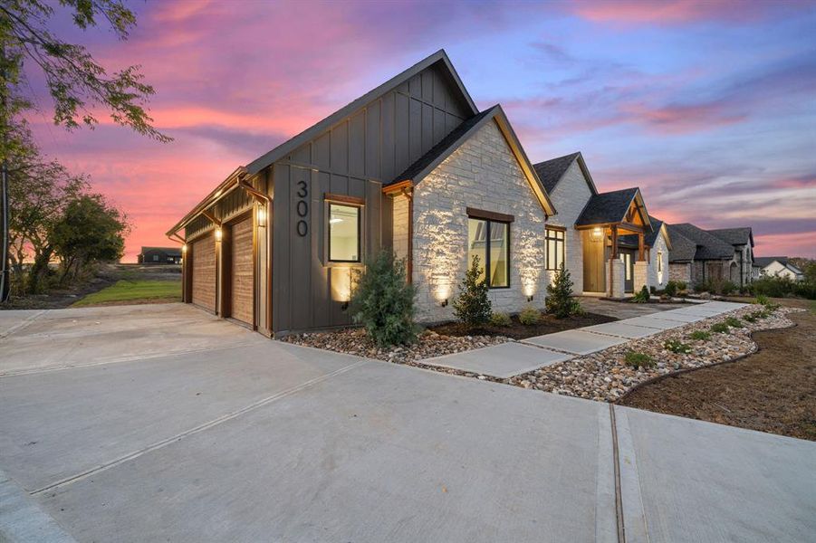 Front exterior of a new home in , Gunter, TX, highlighting curb appeal (Image 1). Front exterior of a new home in , Gunter, TX, highlighting curb appeal (Image 1).