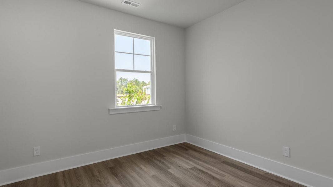 Spacious, unfurnished interior of a new home in Indigo Preserve Townhomes, Leland (Image 19).