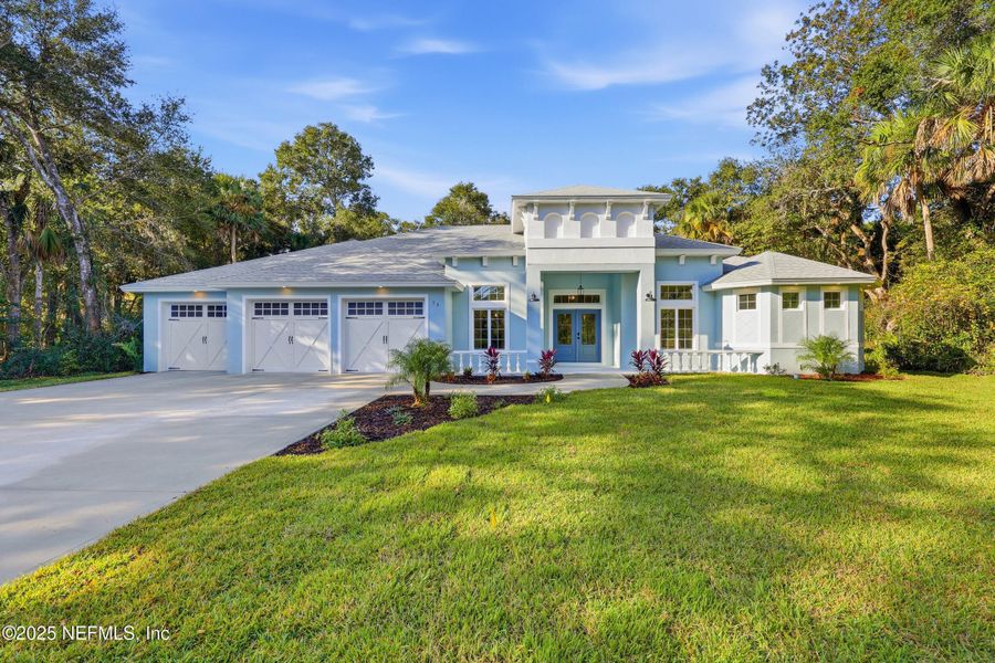 Front exterior of a new home in , Flagler Beach, FL, highlighting curb appeal (Image 1). Front exterior of a new home in , Flagler Beach, FL, highlighting curb appeal (Image 1).