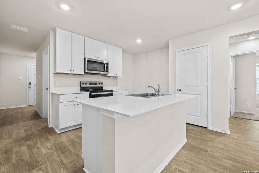 Furnished interior view inside a new home in Spring Valley, New Braunfels (Image 5). Furnished interior view inside a new home in Spring Valley, New Braunfels (Image 5).
