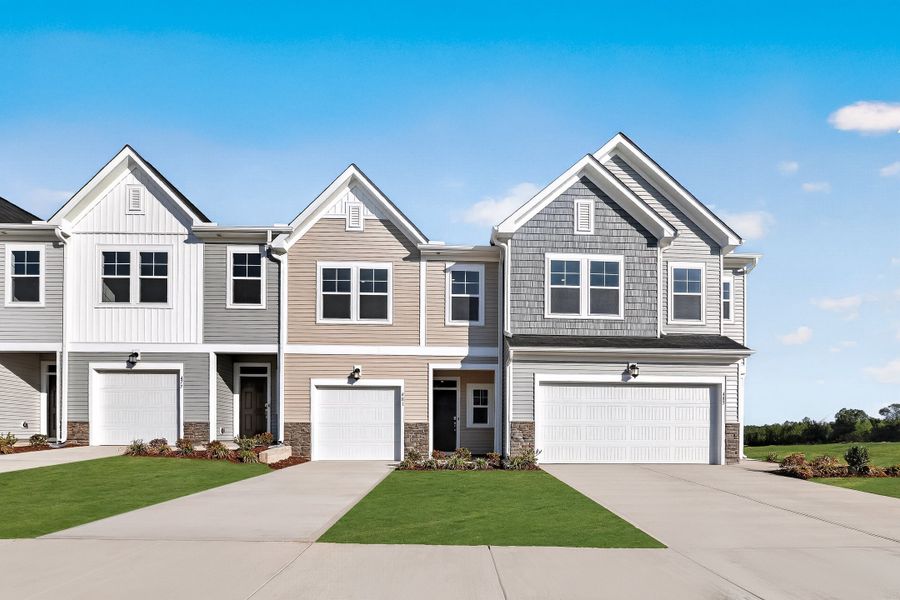 Front exterior of a new home in Marelli, Sanford, NC, highlighting curb appeal (Image 1). Front exterior of a new home in Marelli, Sanford, NC, highlighting curb appeal (Image 1).