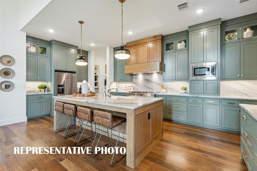 Your chef's dream kitchen comes alive in our Stella floor plan!  REPRESENTATIVE PHOTO