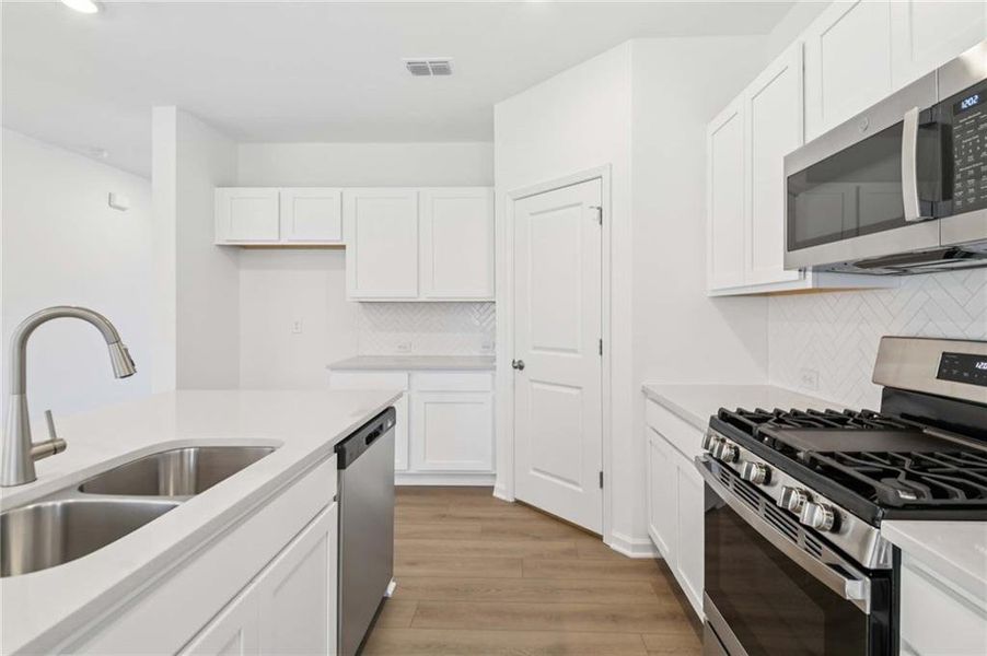 Furnished interior view inside a new home in The Pointe at Heron Bay, Locust Grove (Image 10).