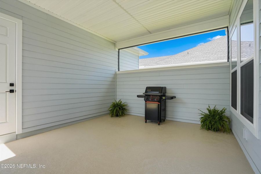 Exterior details and patio area of a home in Seven Pines 50' Rear Entry, Jacksonville (Image 4).