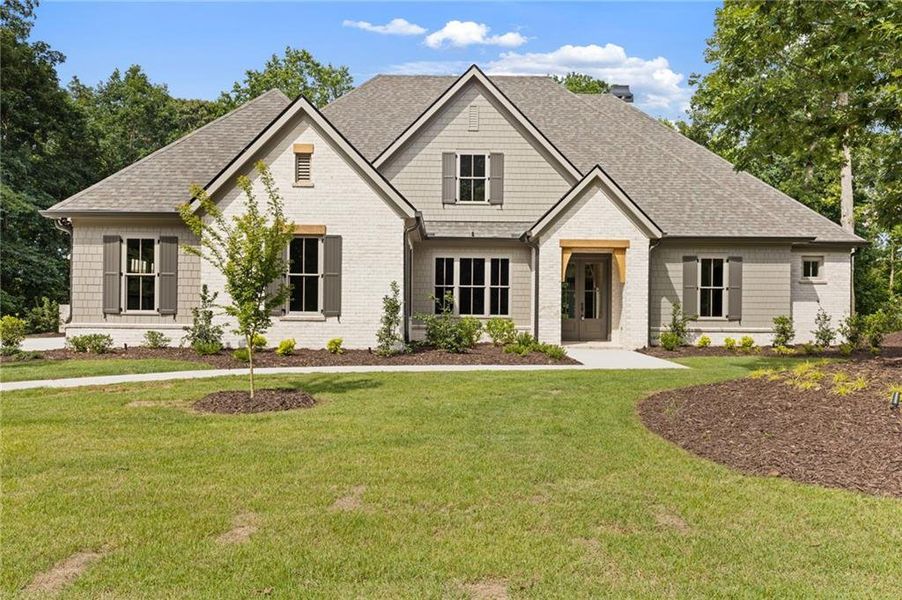 Front exterior of a new home in , Flowery Branch, GA, highlighting curb appeal (Image 27).