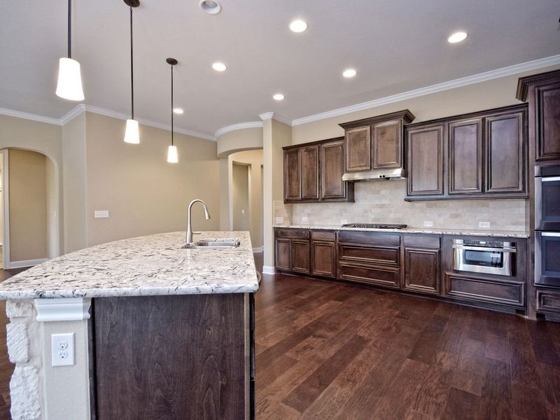 Representative furnished interior of a home built from the Madera II by Giddens Homes in Scofield Farms Estates, Georgetown (Image 242).