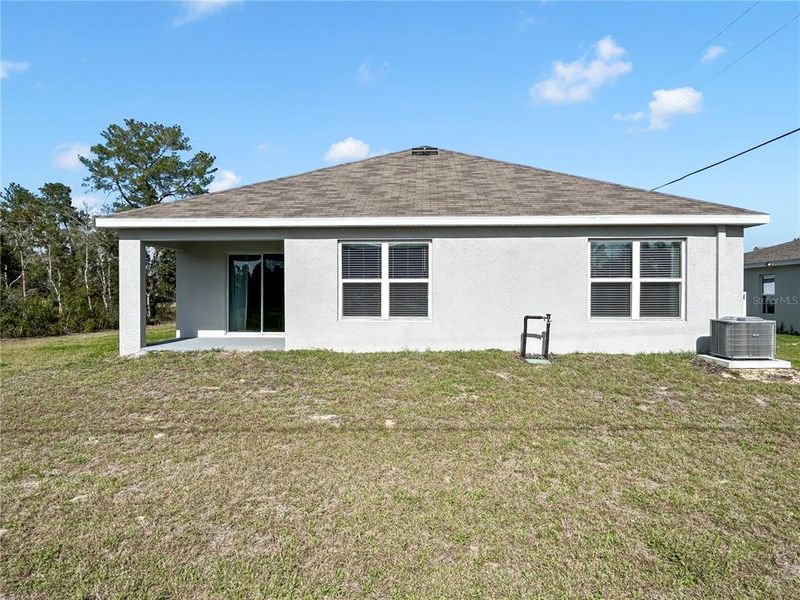 Exterior details and patio area of a home in Marion County Spot Lots, Ocala (Image 3).