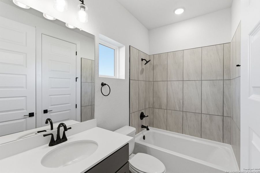 Furnished interior view inside a new home in Caliza Reserve, Boerne (Image 18).