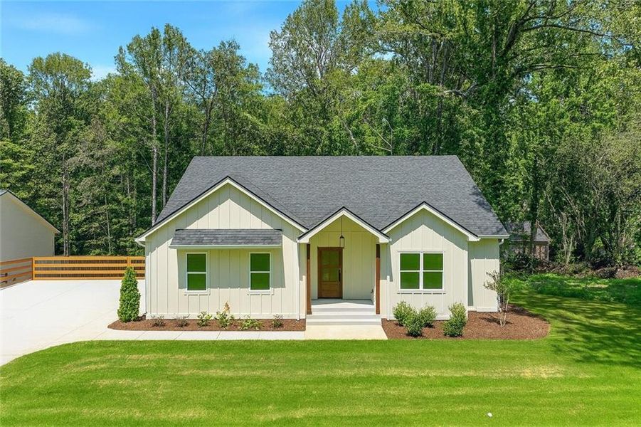 Front exterior of a new home in , Gainesville, GA, highlighting curb appeal (Image 20). Front exterior of a new home in , Gainesville, GA, highlighting curb appeal (Image 20).