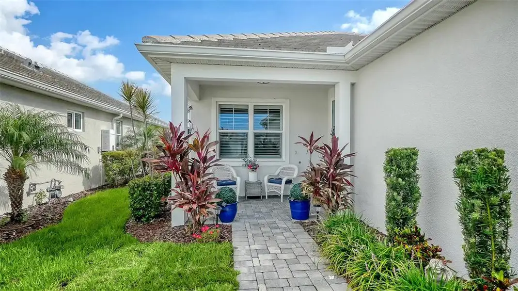 Exterior details and patio area of a home in LakeHouse Cove at Waterside, Sarasota (Image 4). Exterior details and patio area of a home in LakeHouse Cove at Waterside, Sarasota (Image 4).