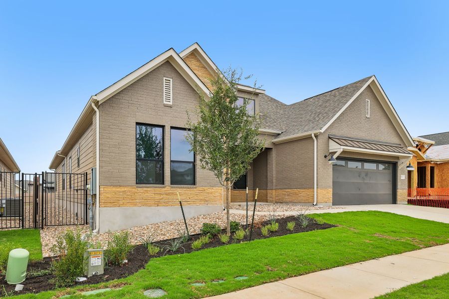 Representative exterior photo of a completed home built from the Davis by Taylor Morrison in Silverleaf, Cedar Creek, TX (Image 23). Representative exterior photo of a completed home built from the Davis by Taylor Morrison in Silverleaf, Cedar Creek, TX (Image 23).