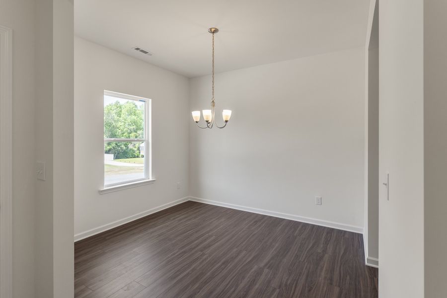 Spacious, unfurnished interior of a new home in The Exchange, Vass (Image 14).