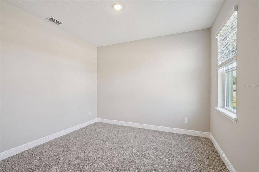 Spacious, unfurnished interior of a new home in Legends Preserve - Signature Series, Daytona Beach (Image 26). Spacious, unfurnished interior of a new home in Legends Preserve - Signature Series, Daytona Beach (Image 26).