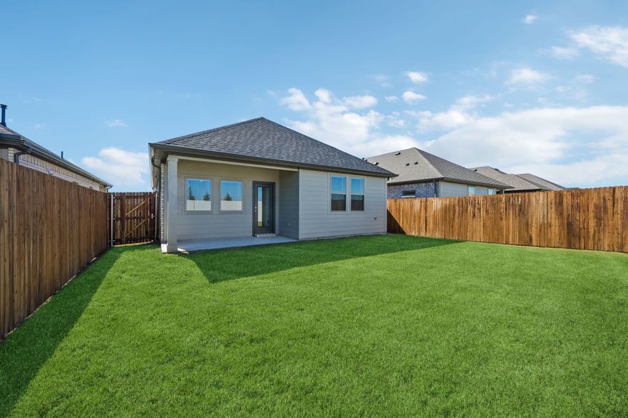 Covered Patio in the Birch home plan by Trophy Signature Homes – REPRESENTATIVE PHOTO