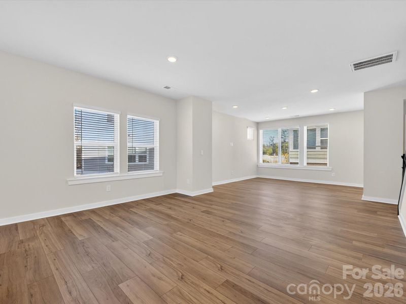 Spacious, unfurnished interior of a new home in Central Living at Craig, Charlotte (Image 22).