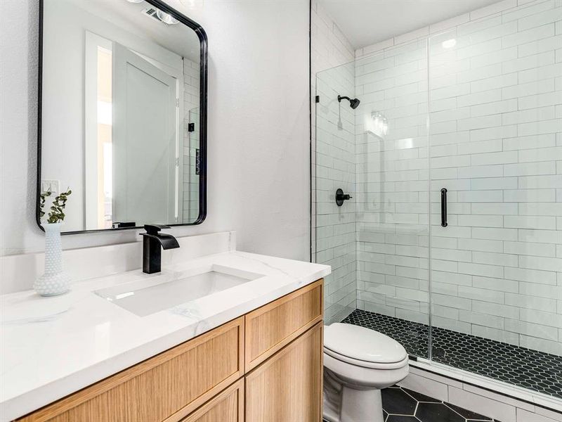 Secondary bedroom ensuite full bathroom.