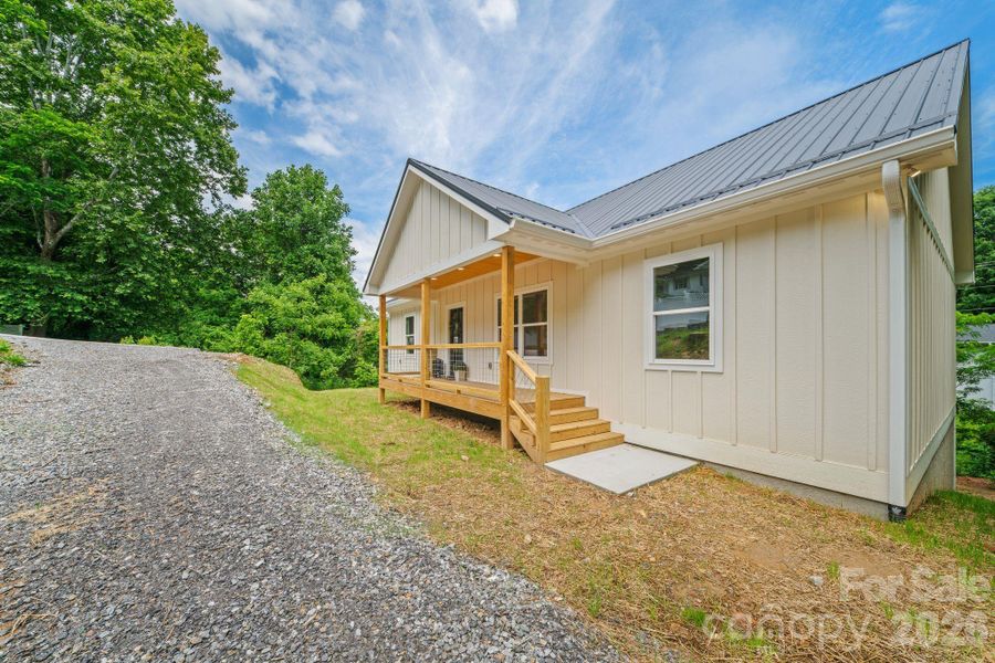 Exterior details and patio area of a home in , Waynesville (Image 28).