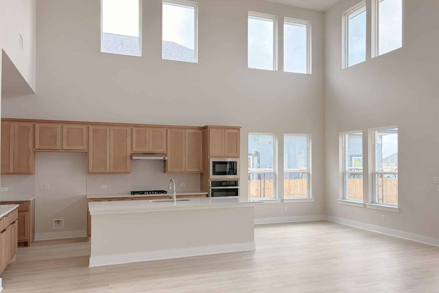 Furnished interior view inside a new home in The Grove at Blackhawk, Pflugerville (Image 7). Furnished interior view inside a new home in The Grove at Blackhawk, Pflugerville (Image 7).