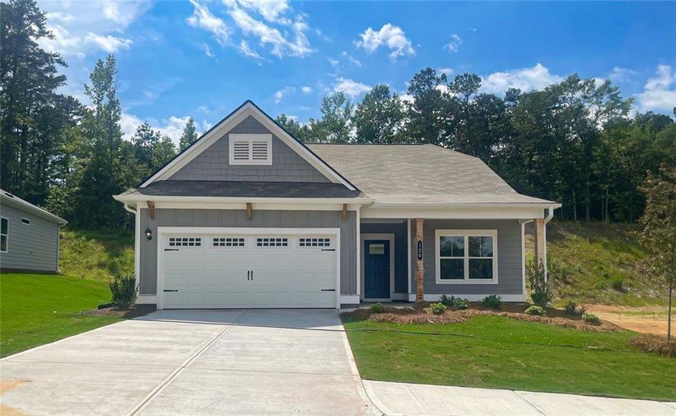 Front exterior of a new home in Summerfield Place, Carrollton, GA, highlighting curb appeal (Image 1). Front exterior of a new home in Summerfield Place, Carrollton, GA, highlighting curb appeal (Image 1).
