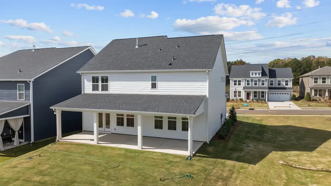 Burton Design large rear covered porch at Lakeside Glen by premier builder DRB Homes in York, SC. Burton Design large rear covered porch at Lakeside Glen by premier builder DRB Homes in York, SC.