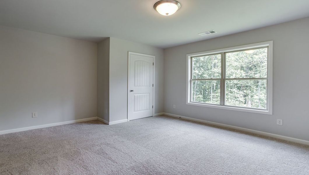 Representative unfurnished interior of a home built from the Edinburgh by D.R. Horton in Thalley Creek Estates, Cumming (Image 30).