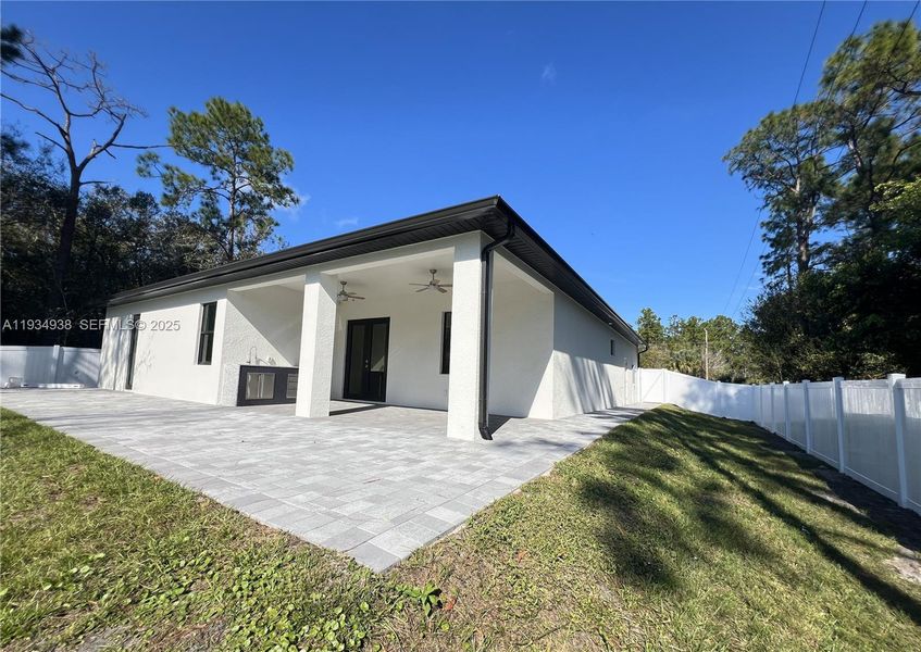 Exterior details and patio area of a home in , Naples (Image 3).