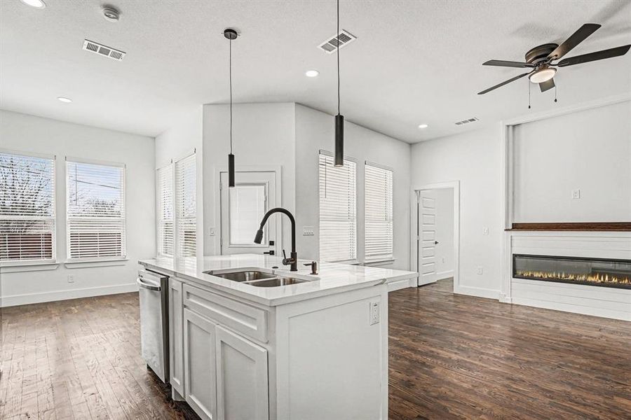 Kitchen is open to living area as well as dining space.