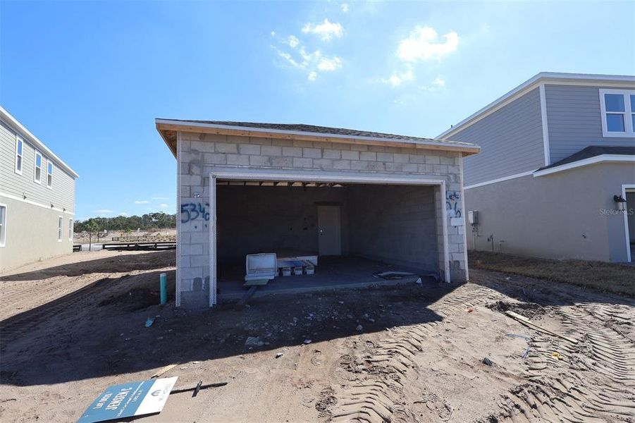 In-progress construction of a new home in Center Lake on the Park, St. Cloud, FL (Image 8).