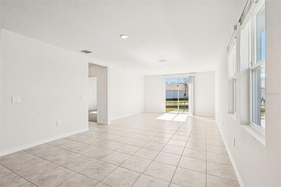 Spacious, unfurnished interior of a new home in Lake Deer Estates - Classic Series, Poinciana (Image 24).