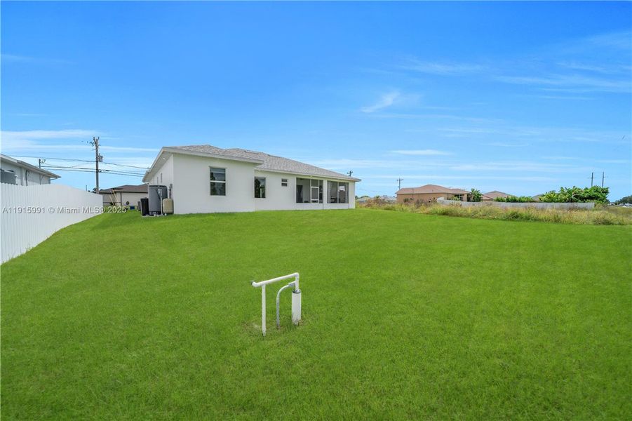 Exterior details and patio area of a home in , Lehigh Acres (Image 4).