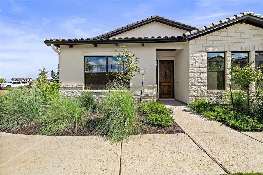 Front exterior of a new home in , Horseshoe Bay, TX, highlighting curb appeal (Image 2).