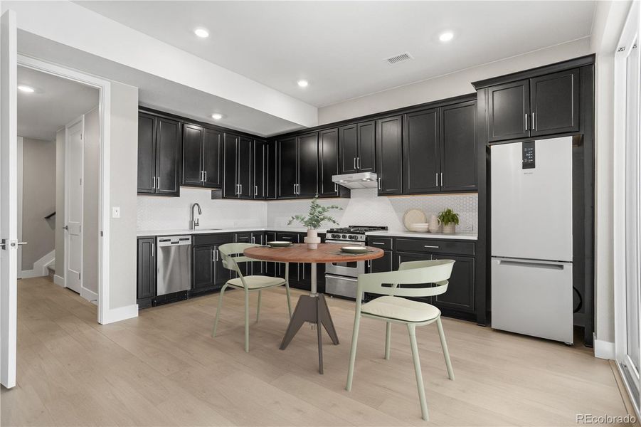 Furnished interior view inside a new home in Tribute at Lyric, Lone Tree (Image 22). Furnished interior view inside a new home in Tribute at Lyric, Lone Tree (Image 22).