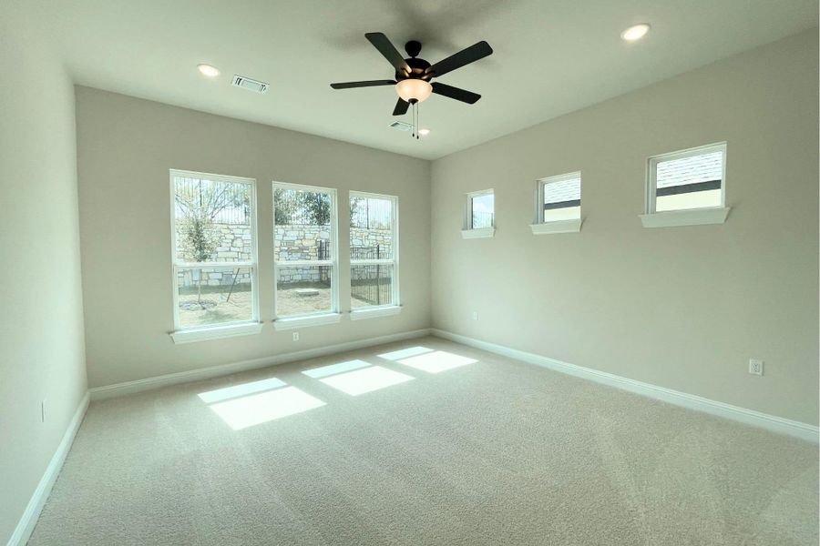 Spacious, unfurnished interior of a new home in Whisper Valley, Manor (Image 26).