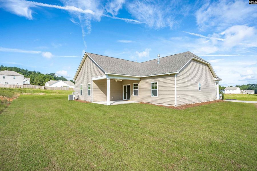 Exterior details and patio area of a home in Rolling Hills, Prosperity (Image 19).