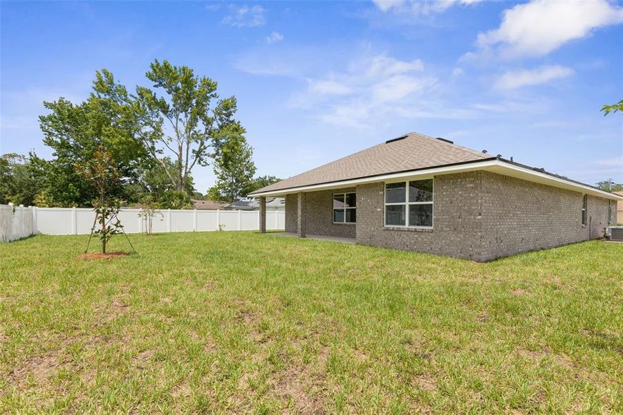 Exterior details and patio area of a home in Palm Coast, Palm Coast (Image 22).