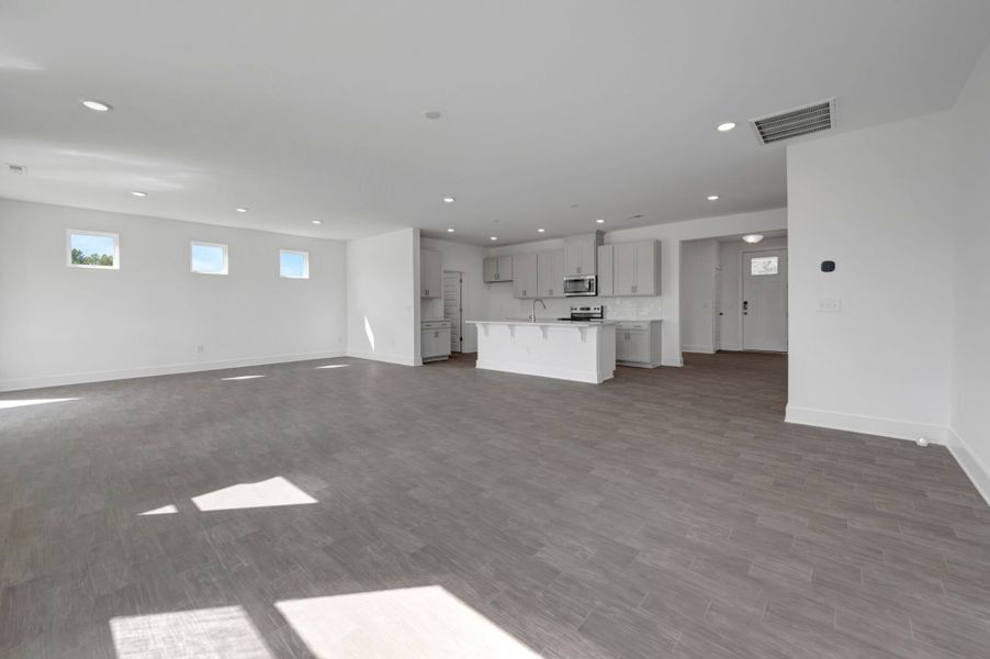 Spacious, unfurnished interior of a new home in McAlister Creek, Clayton (Image 14).