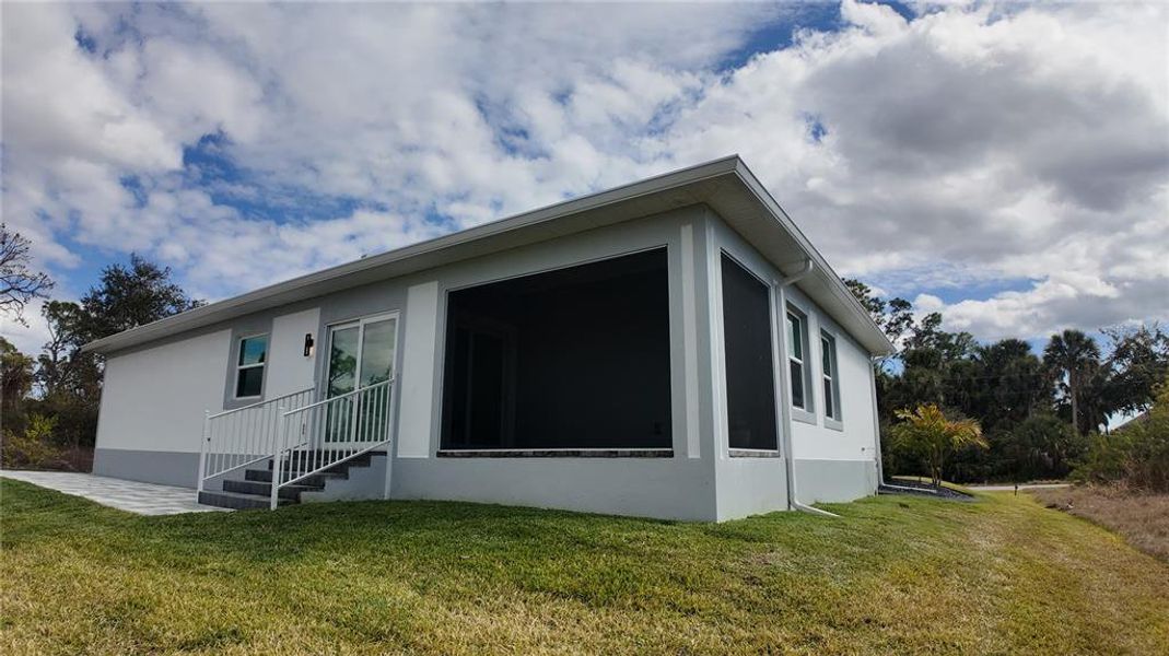 Exterior details and patio area of a home in , Port Charlotte (Image 29).