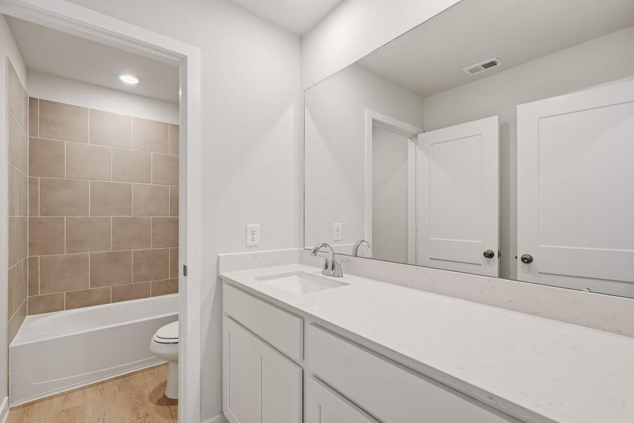 Furnished interior view inside a new home in Northpark South, Porter (Image 9).
