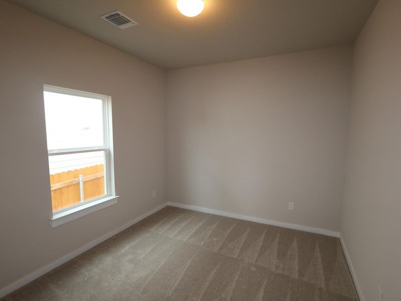 Spacious, unfurnished interior of a new home in Heritage, Dripping Springs (Image 9).