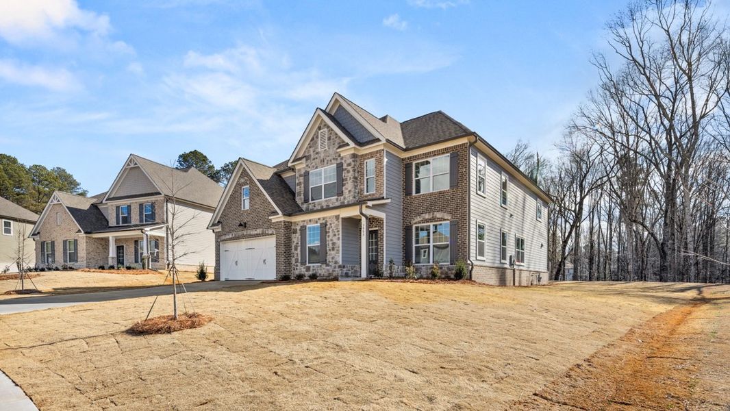 Representative exterior photo of a completed home built from the Westerly by D.R. Horton in Haven Abbey, Cumming, GA (Image 20).
