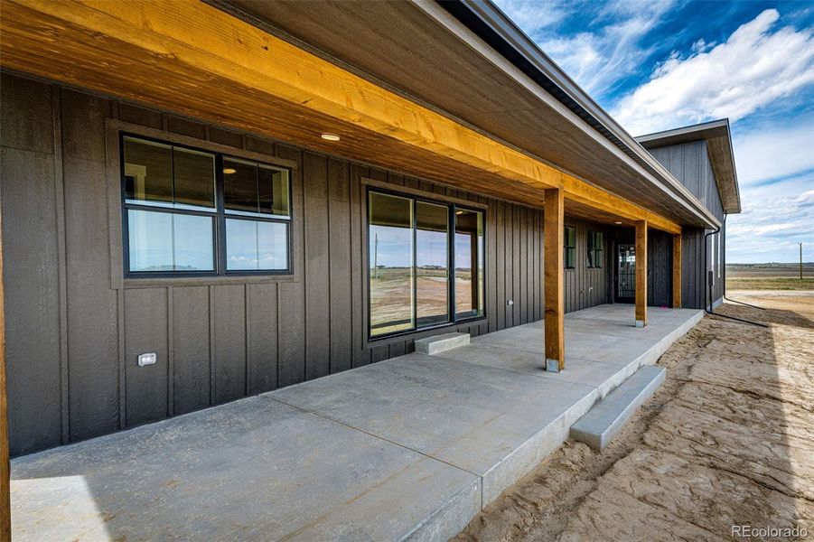 Front exterior of a new home in , Byers, CO, highlighting curb appeal (Image 25). Front exterior of a new home in , Byers, CO, highlighting curb appeal (Image 25).