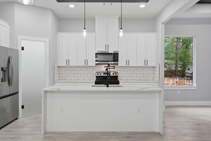 Furnished interior view inside a new home in , Willis (Image 4).